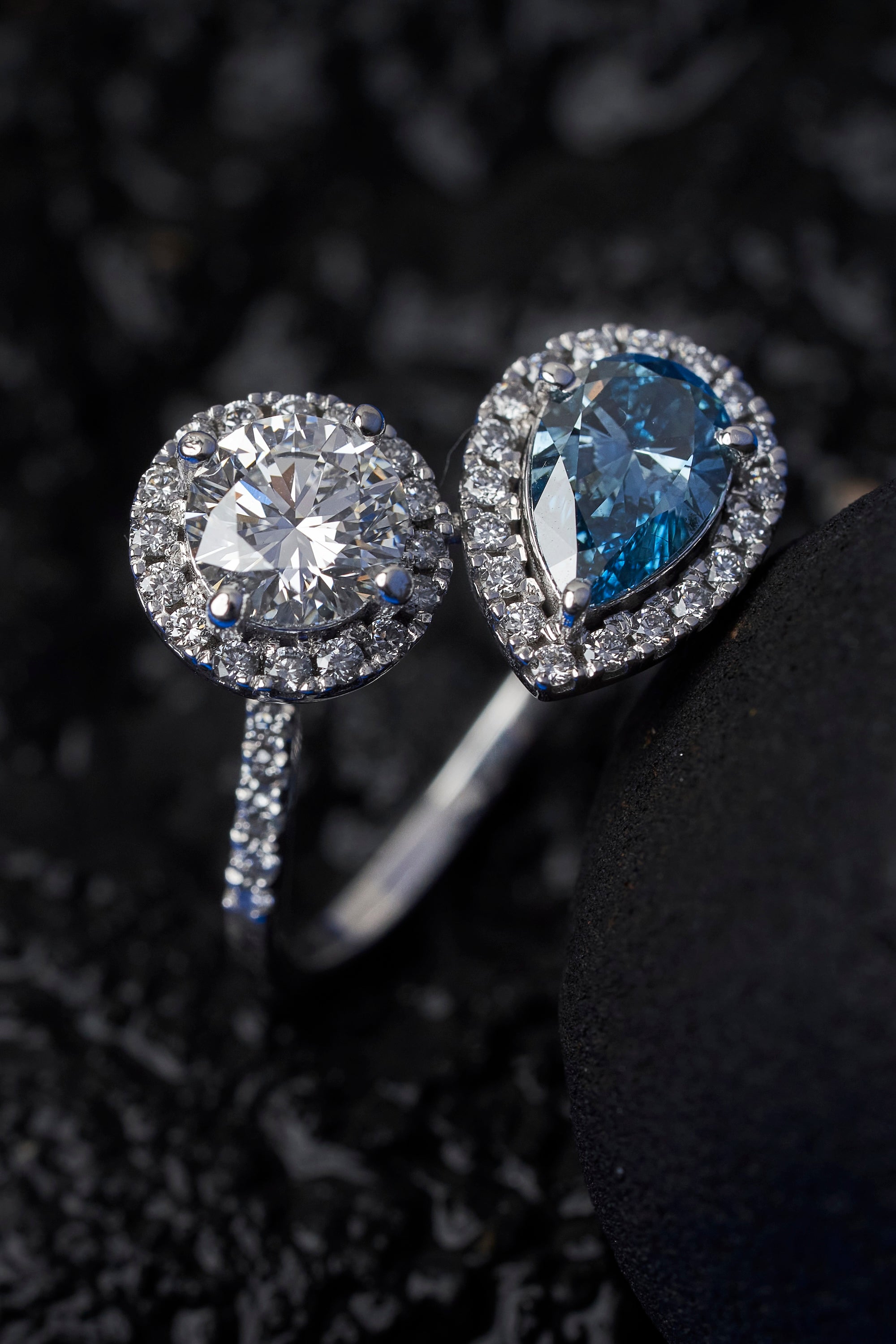 round and pear cut blue diamond ring